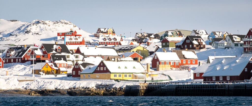 Colorful houses in the historical part of Nuuk under the winter sun - Greenland