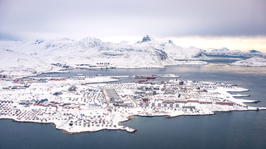 Nuuk city with Store Malene and Kingittorsuaq as seen from above on a scenic flight during winter - Greenland