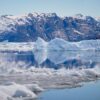 Reflections in the water the Nuuk Icefjord on a boat tour with Guide to Greenland