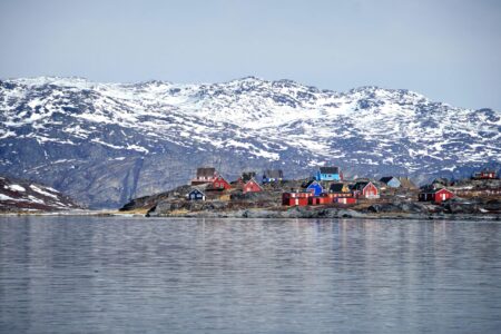 The colourful houses of Qoornoq on a boat tour up the Nuuk Fjord with Guide to Greenland