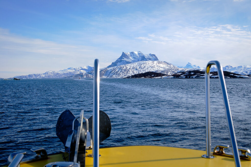 View from the front of the boat heading towards Sermitsiaq mountain on a boat tour to the Nuuk Icefjord with Guide to Greenland