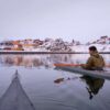 Kayaking in a traditional kayak in winter in Sisimiut - Guide to Greenland