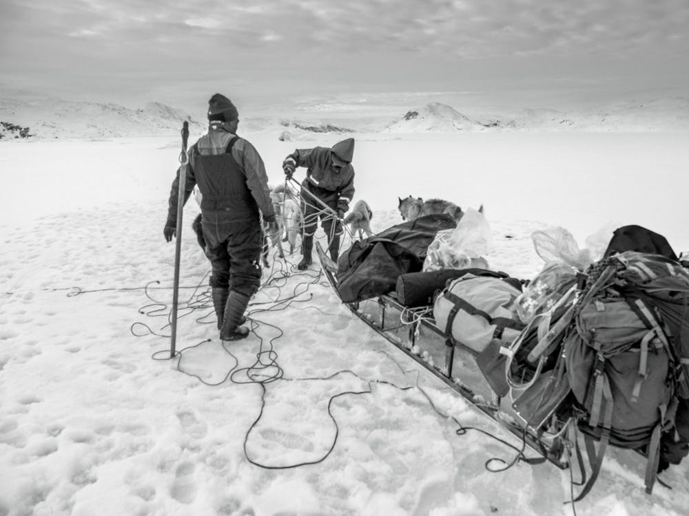 Disembarking warily and swiftly onto thin ice
