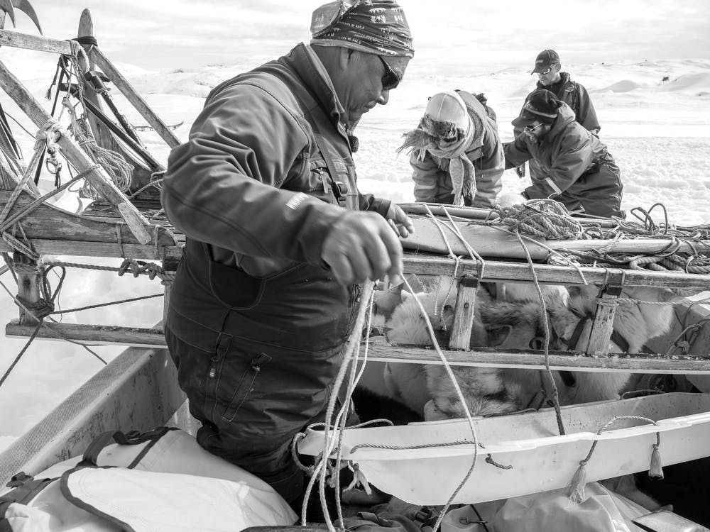 Securing the dog sled to the boat