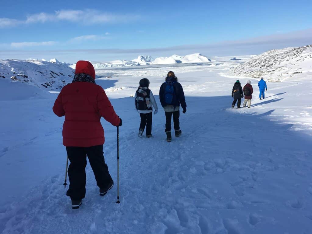 People walking trough the landskape