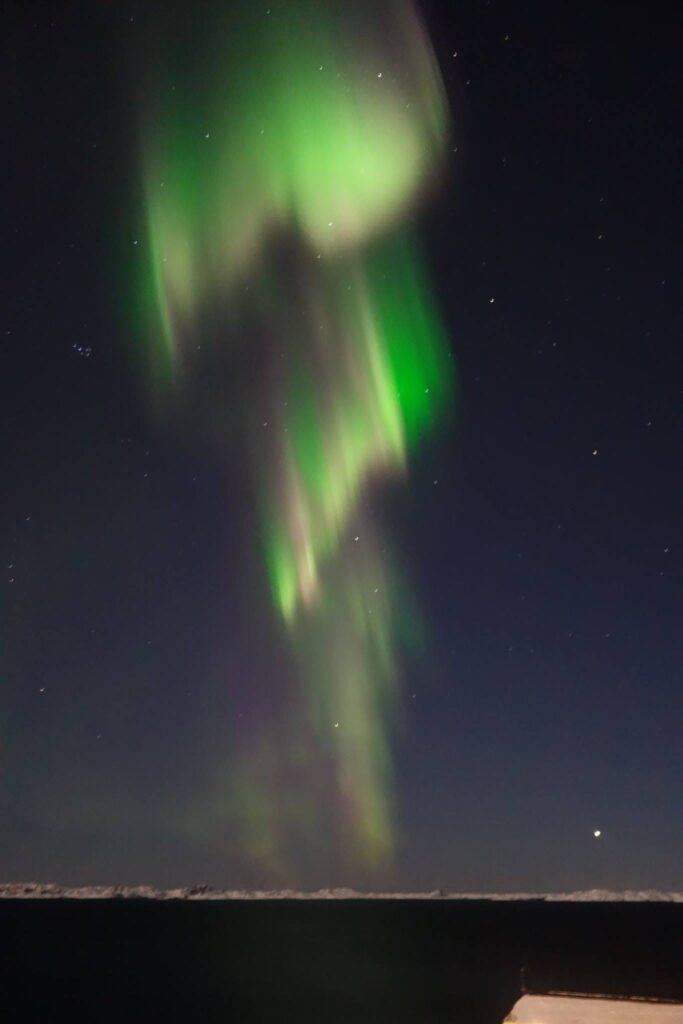 Northern lights over Nuuk, capital of Greenland