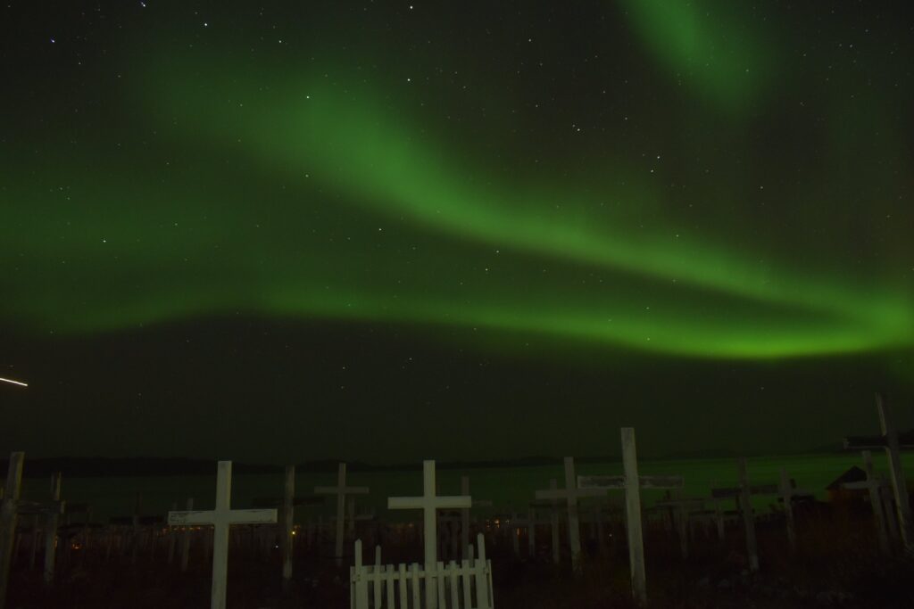 Northern lights over a cemetery in Nuuk, capital of Greenland