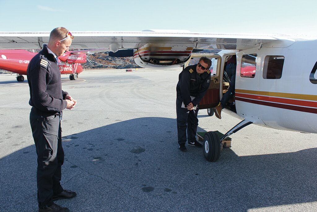 Pilots from Air Greenland preparing for take off