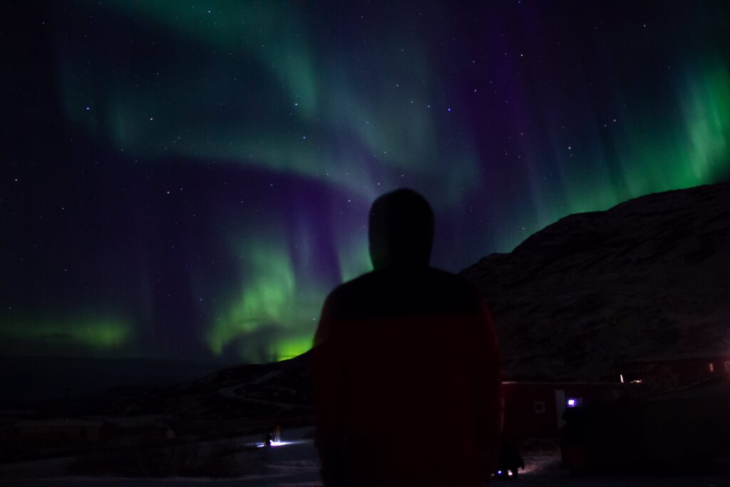 Man watching the northern lights