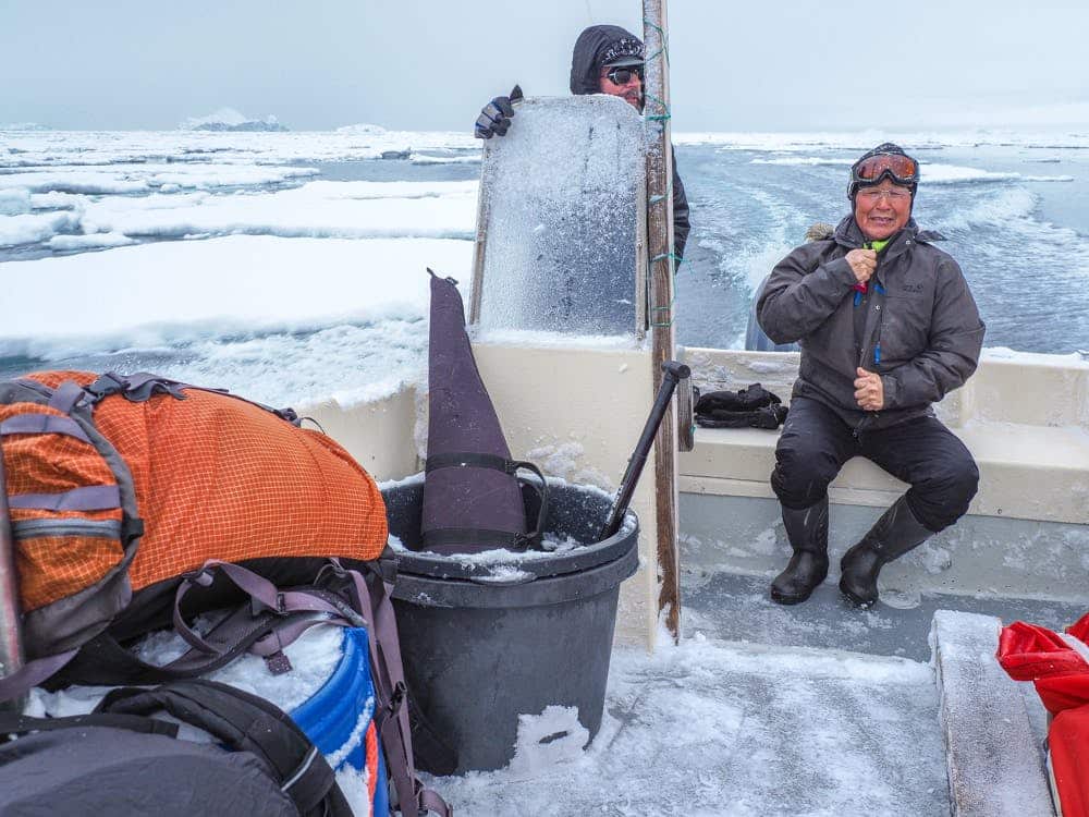 Men on a boat in the icefjord