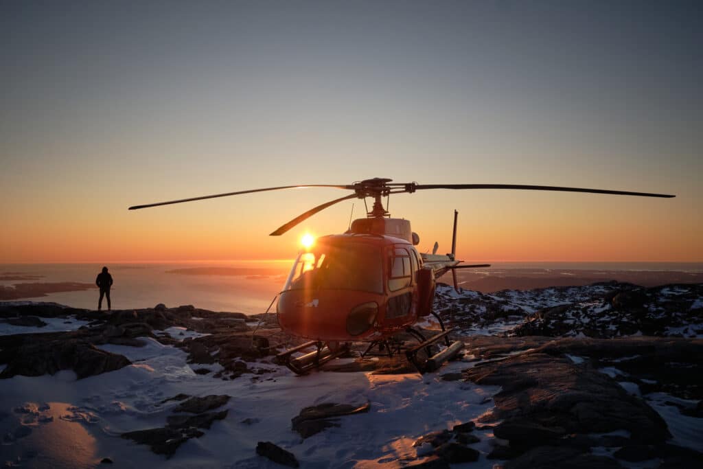 Twilight helicopter scenic flight with a summit landing on Sermitsiaq - Nuuk - Guide to Greenland