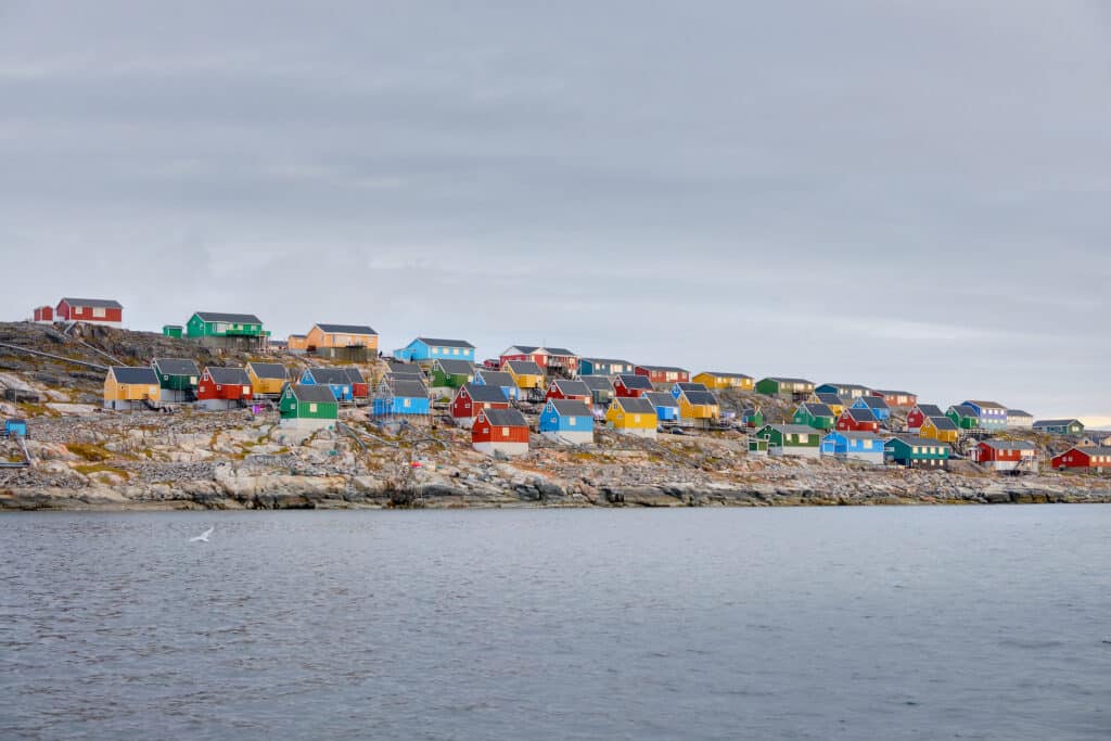 Colourful houses of Aasiaat lining Disko Bay