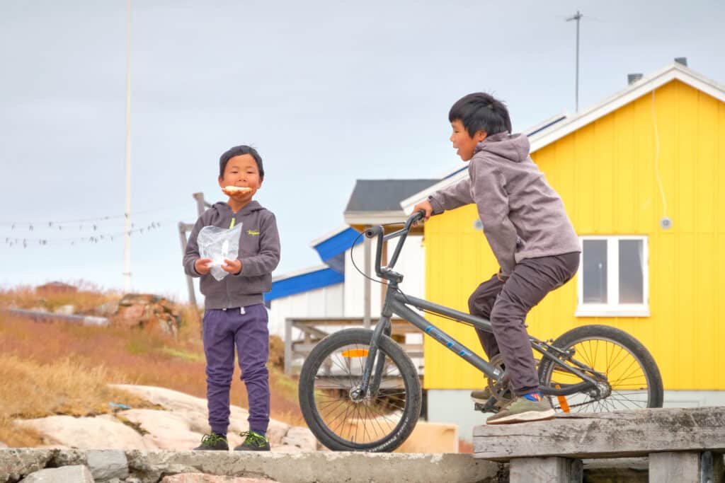 Kids on the dock at Akunnaaq near Aasiaat