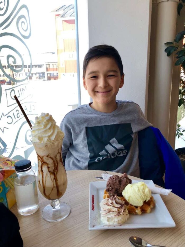 my nephew eating dessert