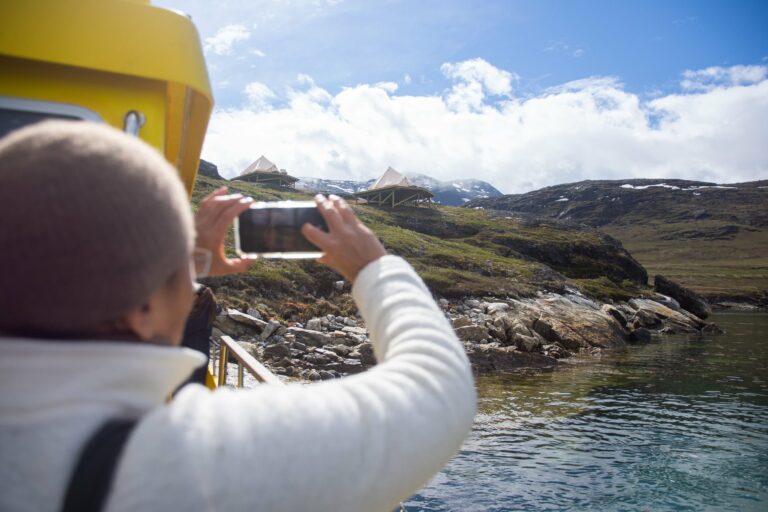 arriving in glamping in Nuuk fjord sunny day- Guide to Greenland