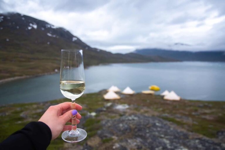 champagne at glamping in Nuuk fjord- Guide to Greenland
