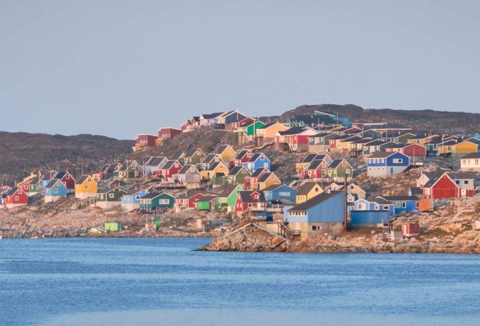 Colorful-houses-of-Aasiaat-line-up-along-Disko-Bay-summer-boat-tour-Guide-to-Greenland Colorful-houses-of-Aasiaat-line-up-along-Disko-Bay-summer-boat-tour-Guide-to-Greenland