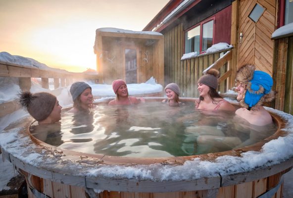 Friends enjoying a wilderness bath spa at the Arctic spa at the hotel sisimiut – Guide to Greenland Friends enjoying a wilderness bath spa at the Arctic spa at the hotel sisimiut